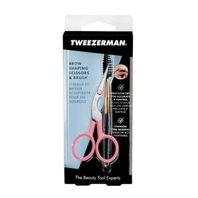 Tweezerman set next to a hand to show compact size and travel-friendly convenience