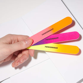 Tweezerman three neon Filemates displayed to highlight color and set convenience
