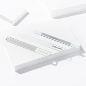Tweezerman nail tools arranged on vanity conveying tidy routine and quick touch-ups