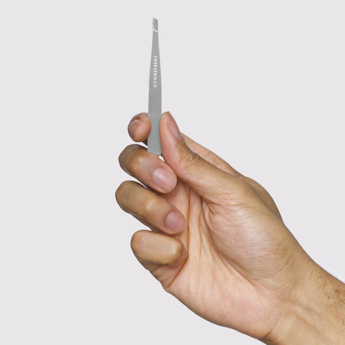 Tweezerman tweezer body detail displaying calibrated tension for steady control