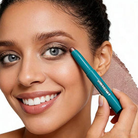 TWLBXMG travel-ready stick inside a compact makeup bag for touch-ups