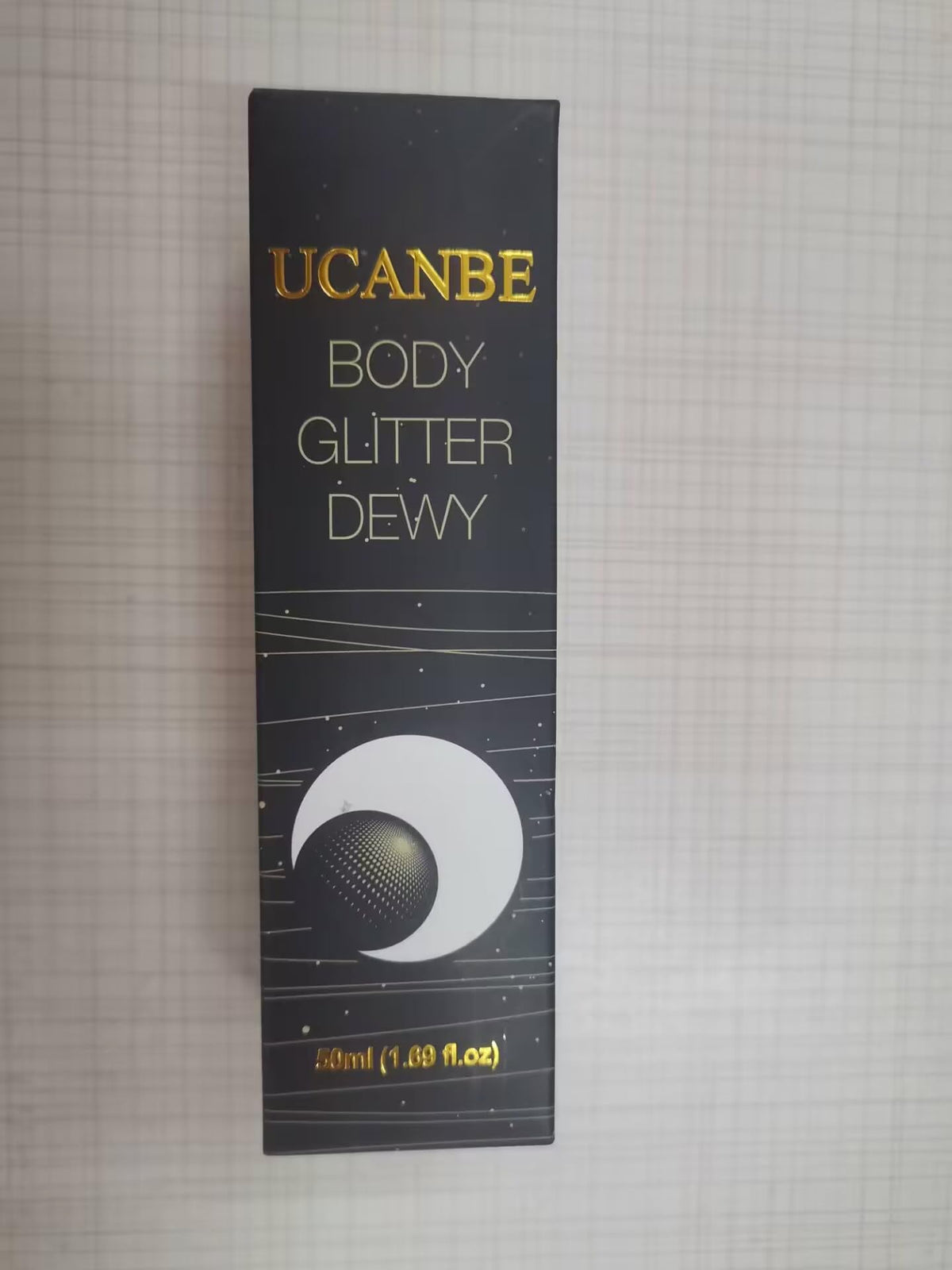 UCANBE staged on vanity with other cosmetics for everyday styling