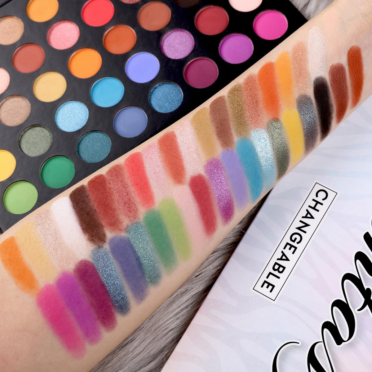 UCANBE arm swatches displaying true-to-pan pigment and color payoff