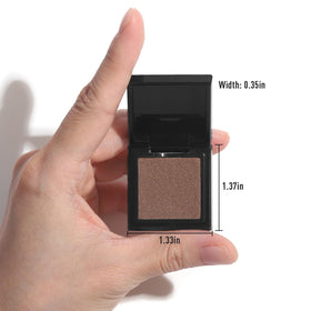 UCANBE compact palette held in hand showing travel-ready size and secure closure for portability
