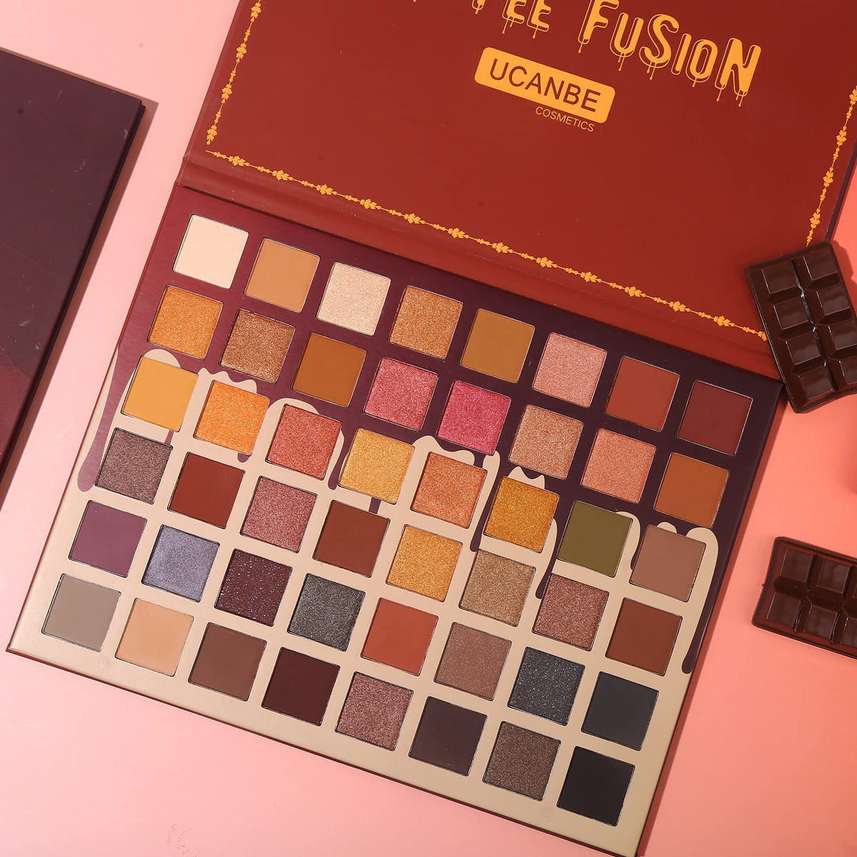 UCANBE palette in hand for scale showing travel-friendly convenience