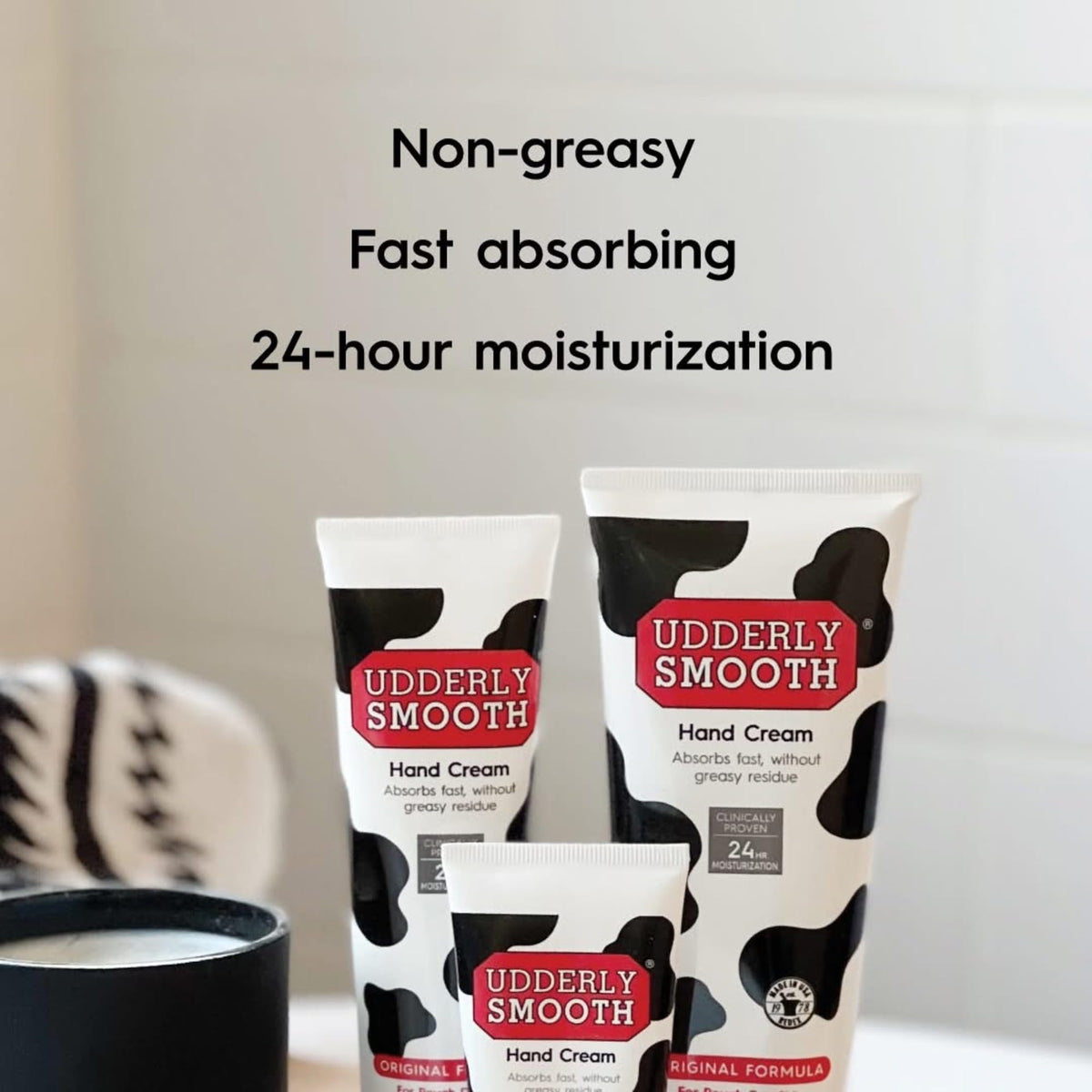 Udderly Smooth hand application demonstrating on-the-go hydration and immediate comfort