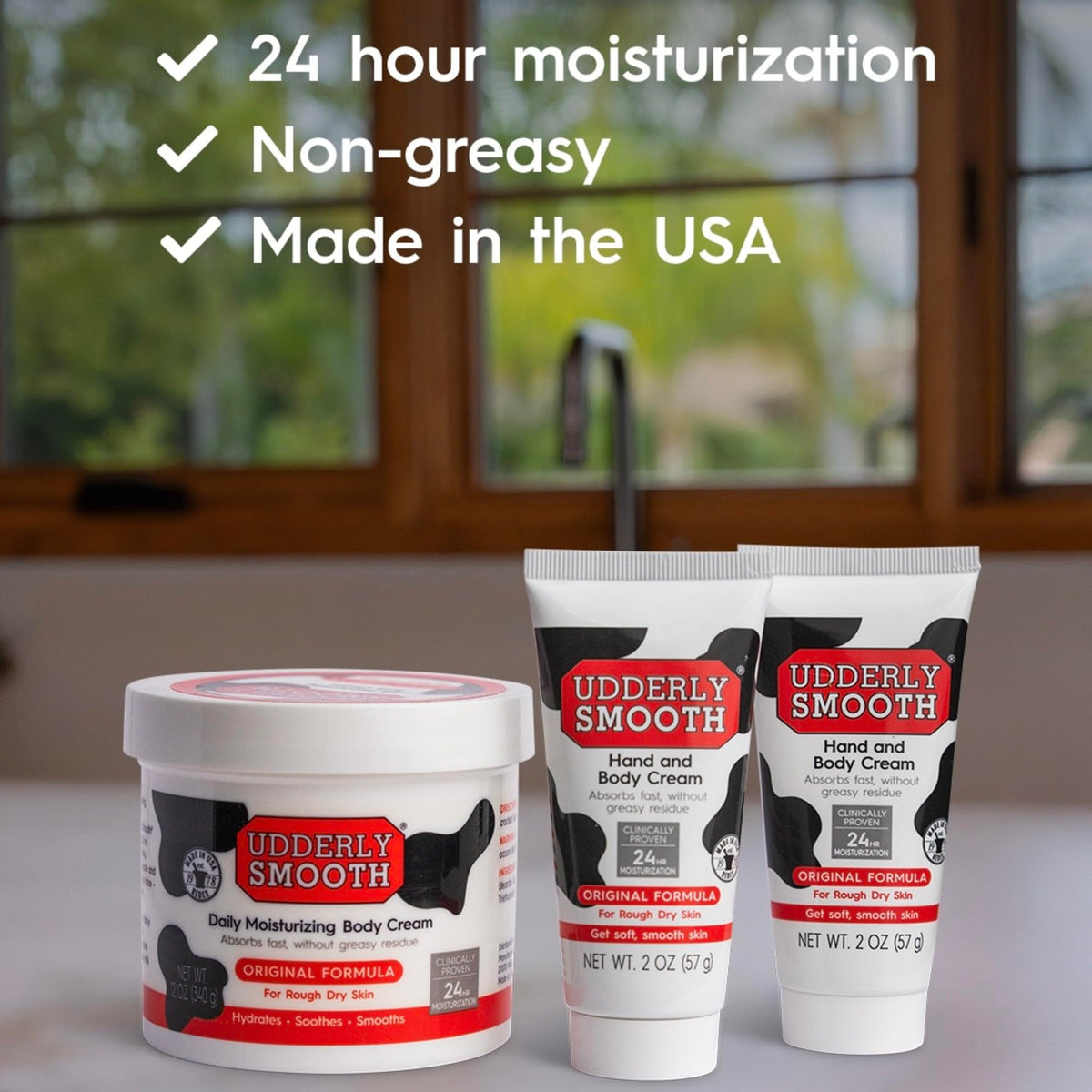 Udderly Smooth hand cream close-up showing tube detail and fast-absorbing texture benefit