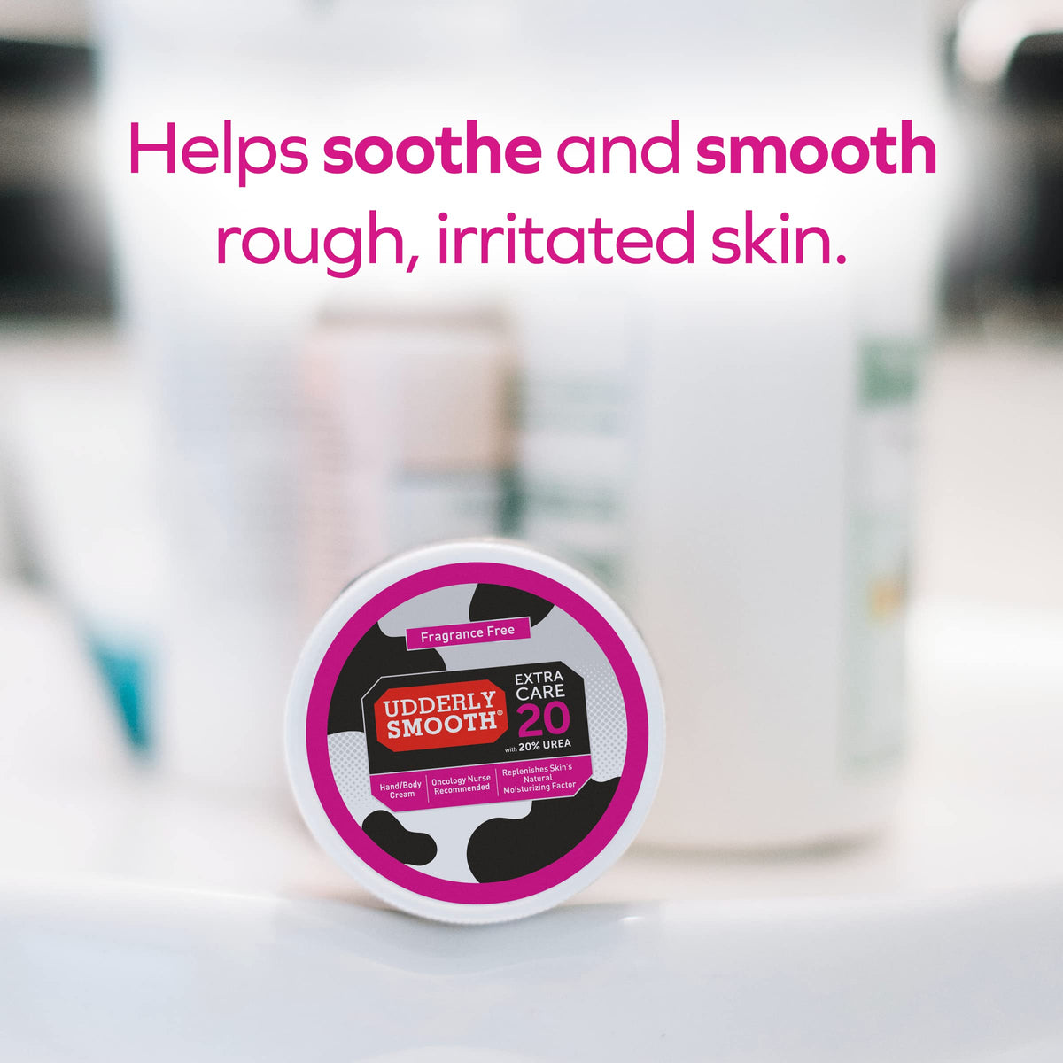 Udderly Smooth next to ruler to illustrate 8 oz size practical use