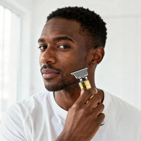 Ufree trimmer beside smartphone showing compact size and travel convenience