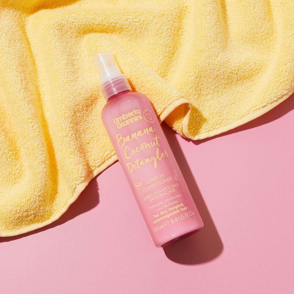 Umberto Giannini bottle on bathroom shelf for travel-ready convenience benefit