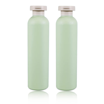 UMETASS front view of two squeeze bottles showing shape and label benefit leak-resistant travel containers
