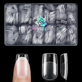 UNA GELLA tips next to a hand model for realistic size comparison