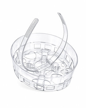unibouti insert beside hand showing compact size and portability