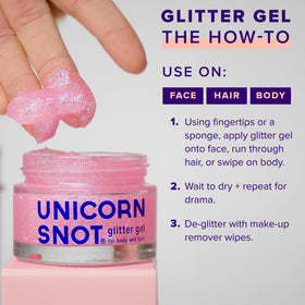 UNICORN SNOT Flamingo jar held in hand to show 1.7 oz scale and travel-friendly size