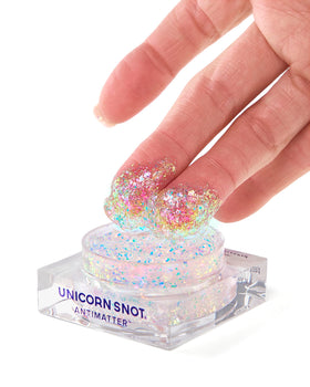 Unicorn Snot fingertip applying paste showing easy one-touch application