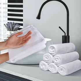 UNIMADE lifestyle bathroom shelf with towels suggesting spa-like cleanliness and comfort