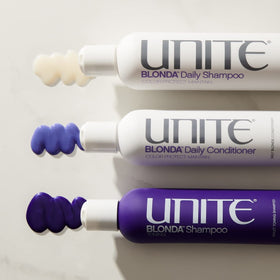 UNITE Hair BLONDA held in hand for scale showing compact 8 fl oz size benefit