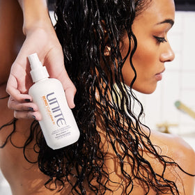 UNITE BOING applied to curls while diffuser enhances defined shape