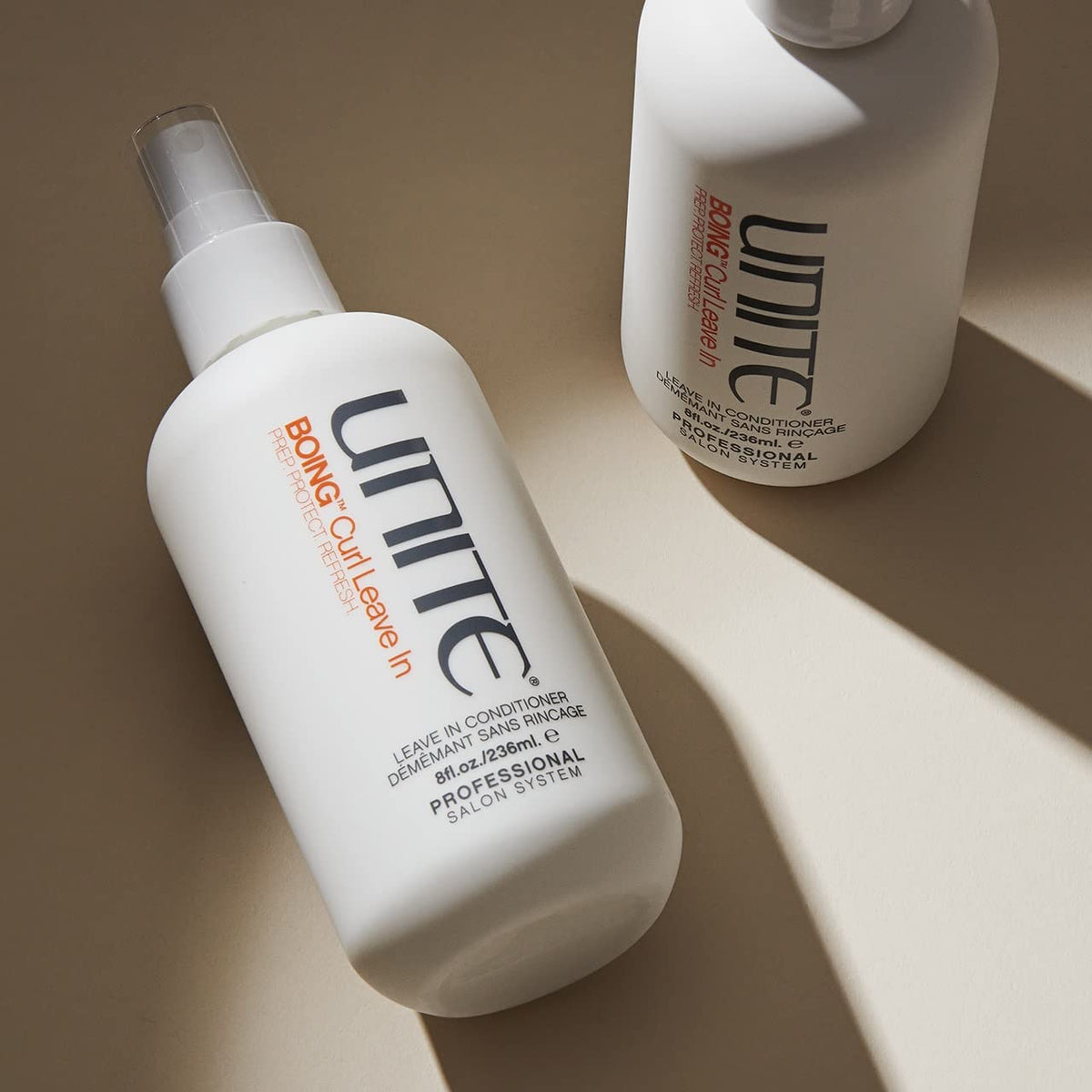 UNITE BOING spray nozzle closeup delivering fine mist for detangling