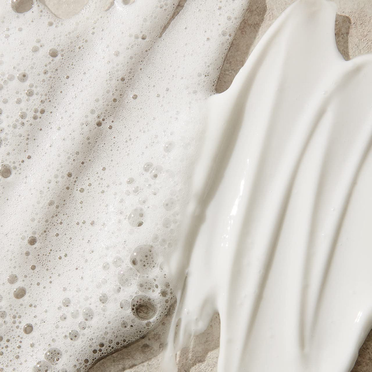 UNITE Hair shampoo in shower showing in-use hydration benefit