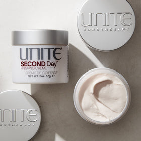 UNITE SECOND Day close-up of cream texture illustrating lightweight spreadability