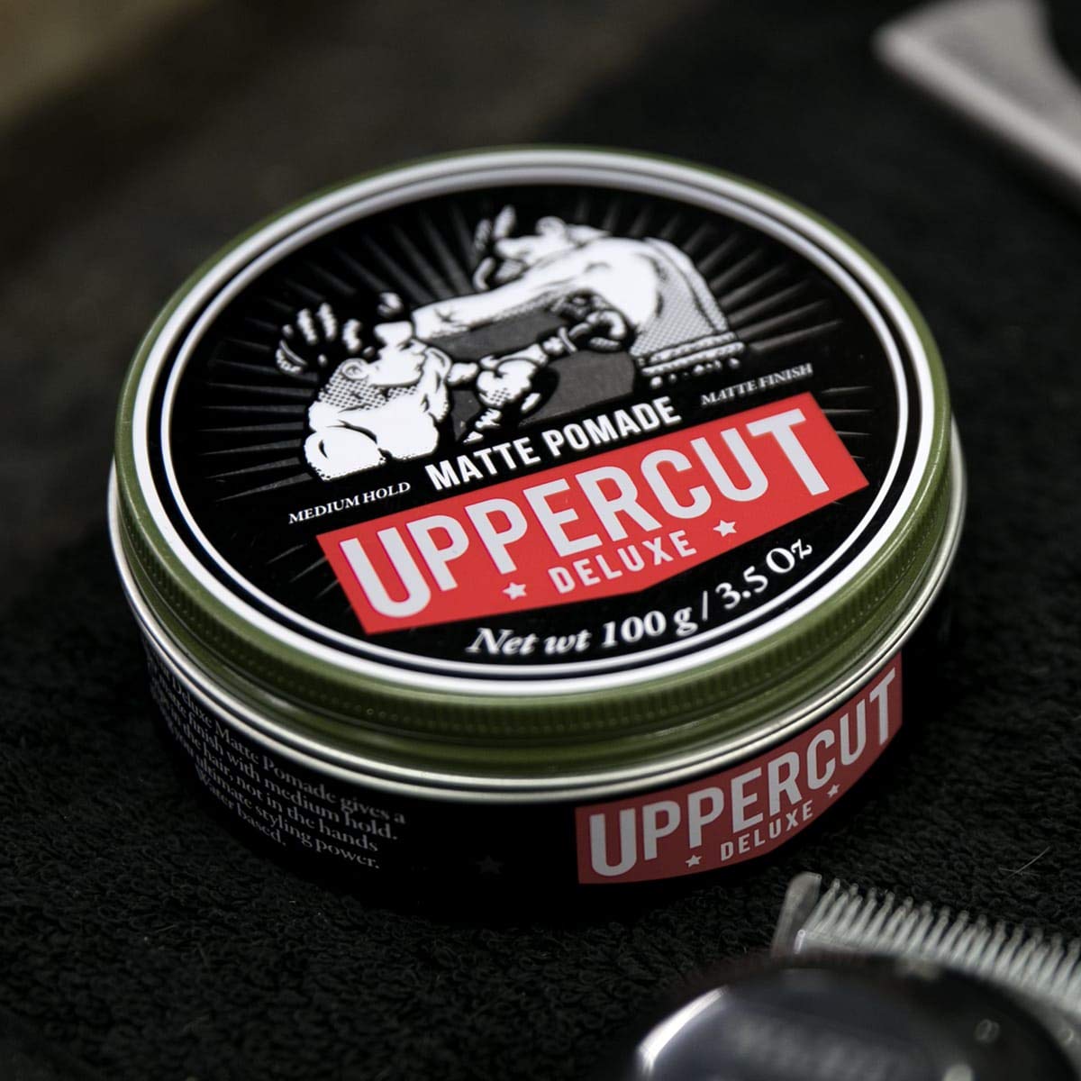 UPPERCUT DELUXE in barber shop setting showing professional grooming results