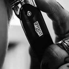 Uppercut Deluxe on bathroom shelf in lifestyle scene for everyday grooming