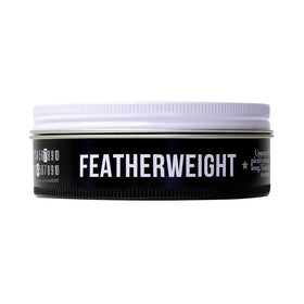 Uppercut Deluxe product on hands being worked in for smooth even application benefit