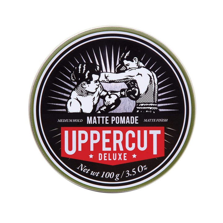 UPPERCUT DELUXE front tin view showing clean matte packaging and product benefit