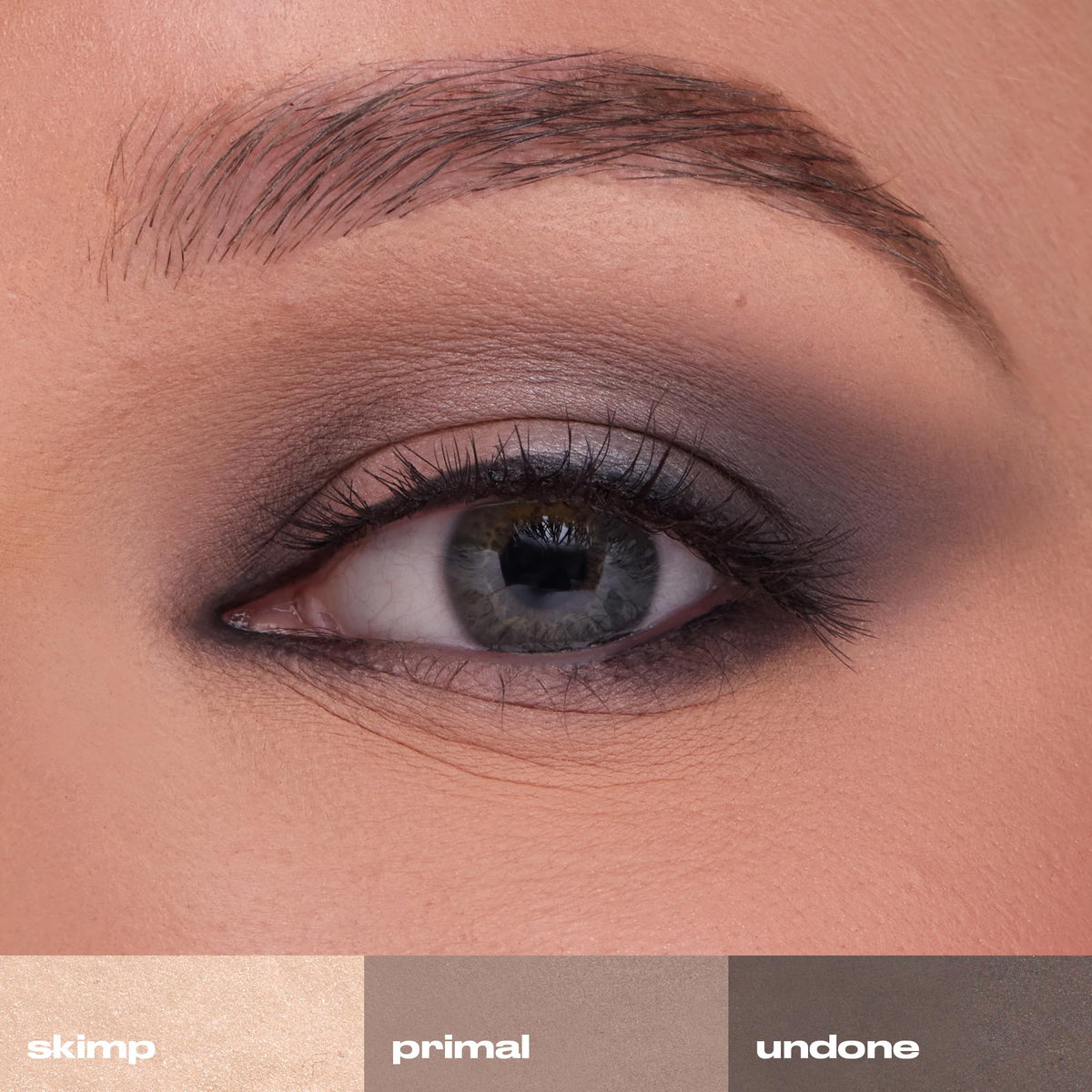 URBAN DECAY applying a mid-tone shade to eyelid demonstrating quick daytime look