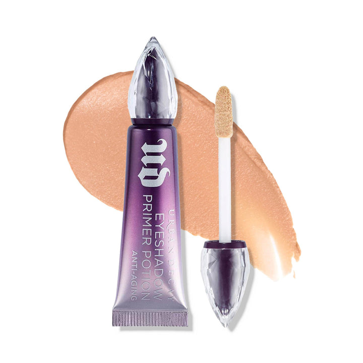 Urban Decay primer front packaging showing compact travel mini and branding benefit