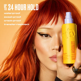 Urban Decay fine mist texture spraying across face, showing lightweight hold