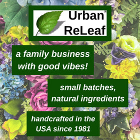 Urban ReLeaf bottle on bathroom counter beside towel suggesting daily aftercare routine