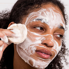 Urban Skin Rx bar in hand demonstrating size and travel-friendly convenience