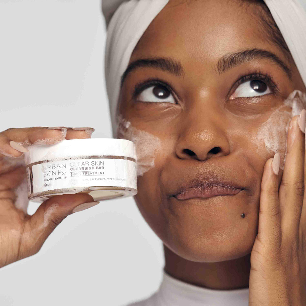 Urban Skin Rx sponge creating creamy lather for easier application and coverage