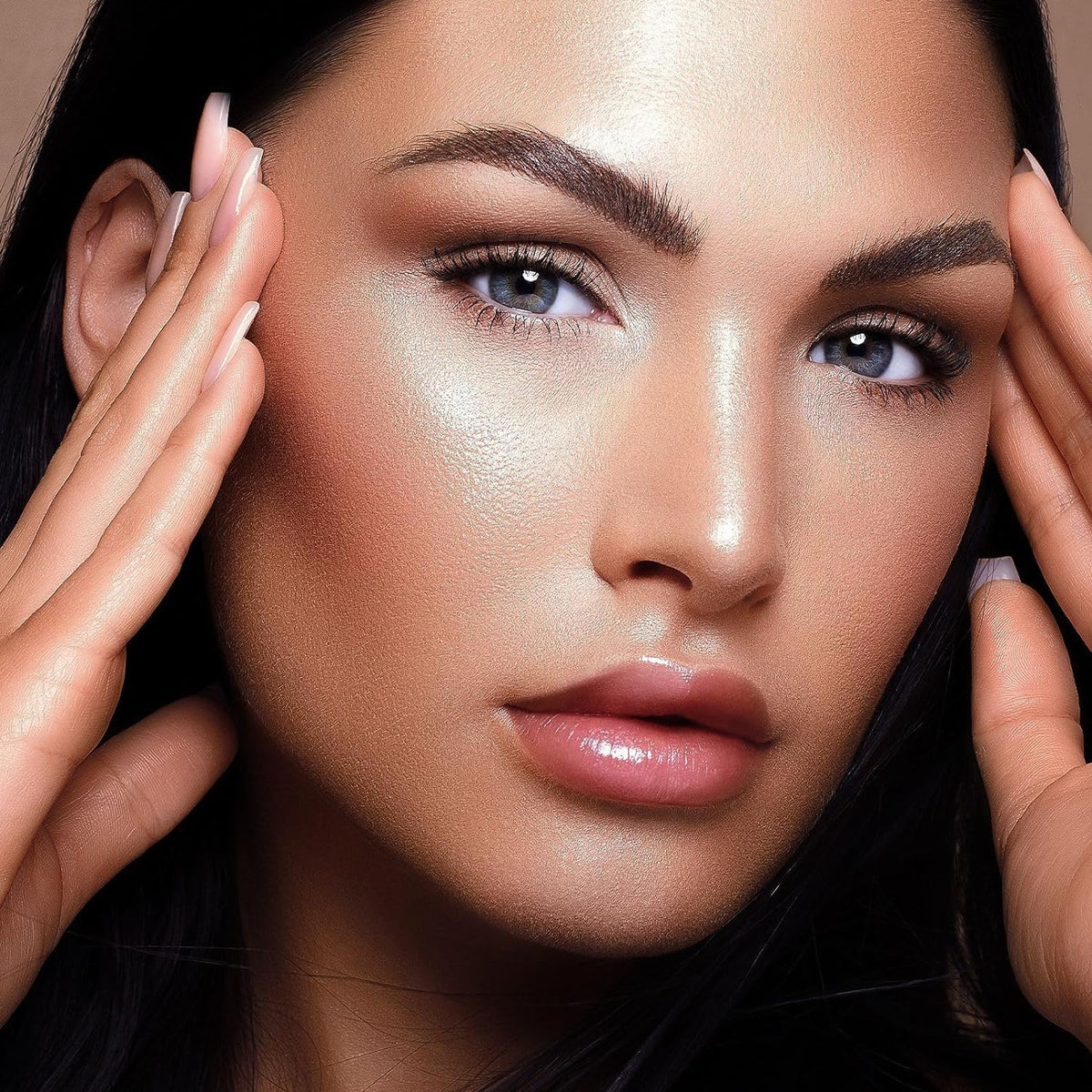 URQT wand in use along cheekbone for quick targeted application benefit