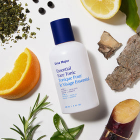 Ursa Major 4 oz bottle next to common items showing scale and travel-friendly benefit