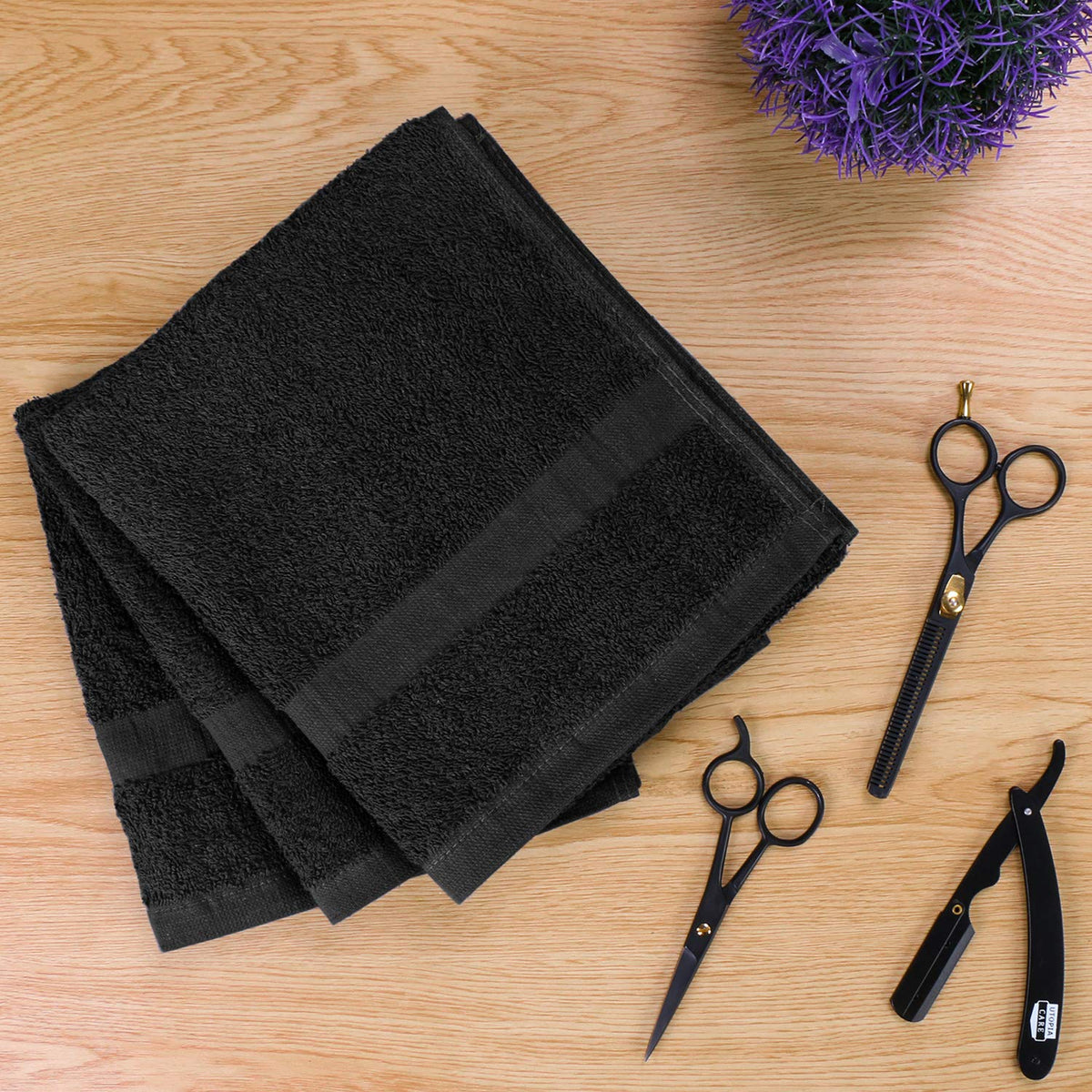 Utopia Towels draped around client in salon, quick absorbency benefit