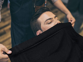 Utopia Towels wrapped around neck in salon for comfort and protection