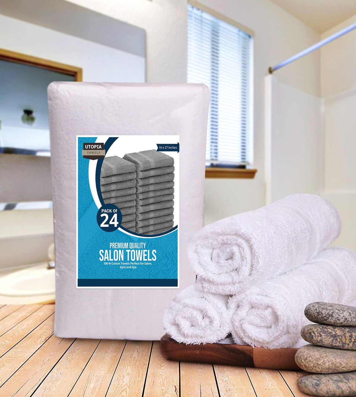 Utopia Towels size comparison with a hand to show 16x27 inch scale benefit
