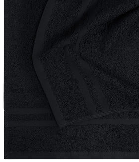 Utopia Towels next to ruler illustrating accurate 16 by 27 inch scale