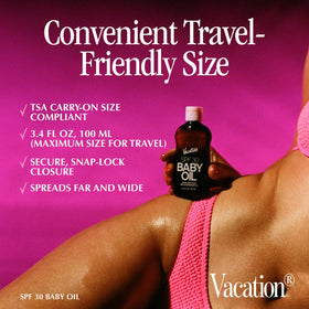 VACATION bottle held in hand showing travel-friendly size and convenience