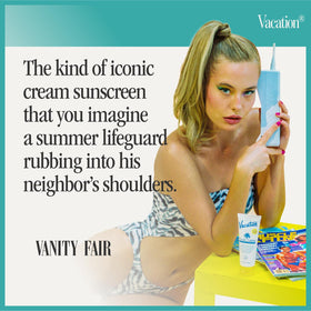 VACATION bottle on beach towel evoking scent and water-resistant use