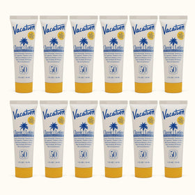 VACATION mini SPF 50 front packaging showing compact travel tubes and branding benefits