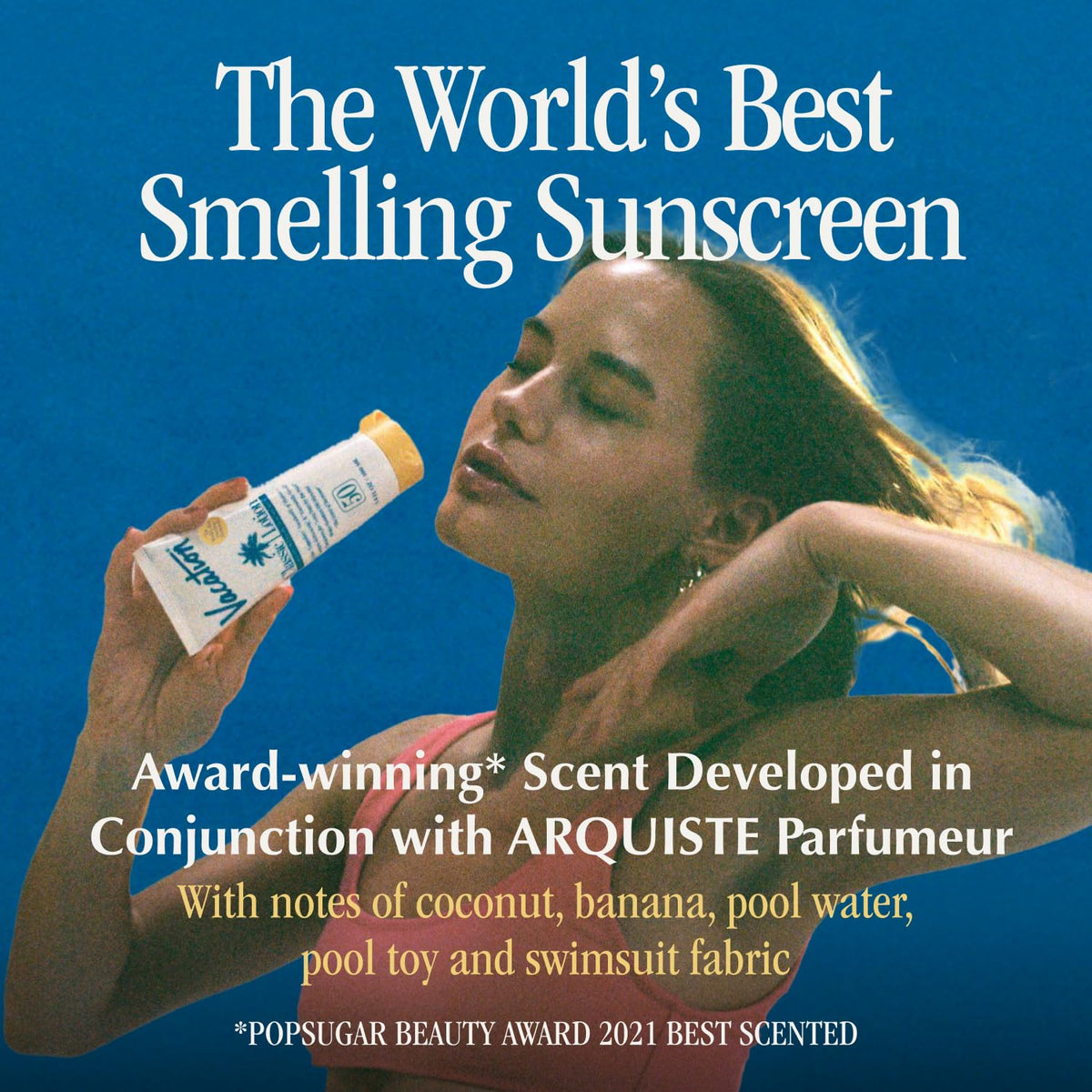 VACATION mini sunscreen on beach towel near sunglasses illustrating travel convenience