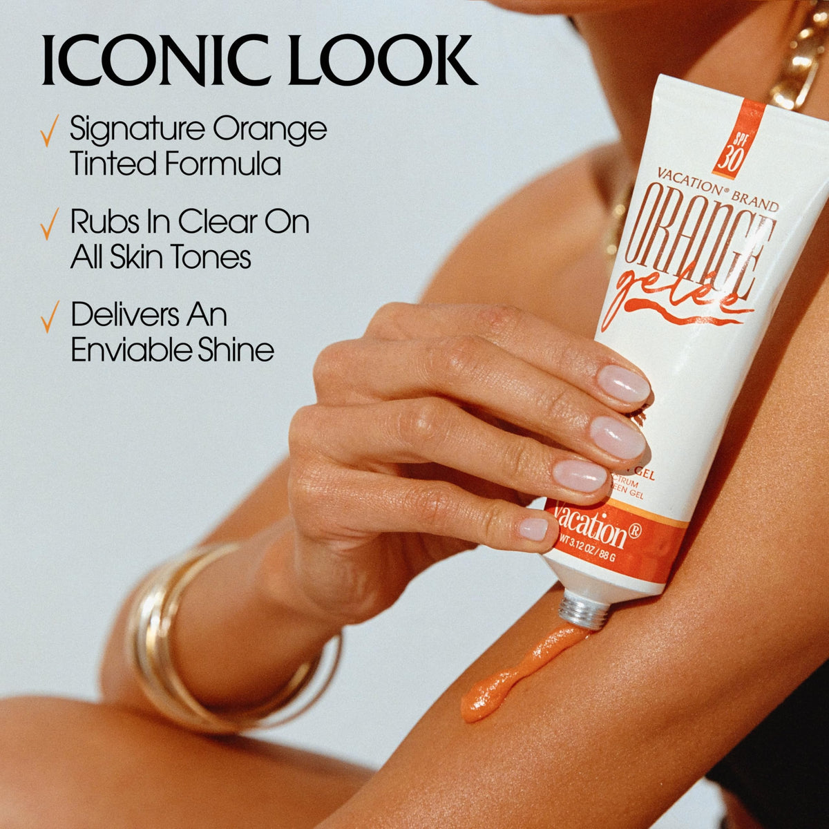 VACATION gel being rubbed into skin illustrating streak-free glow benefit