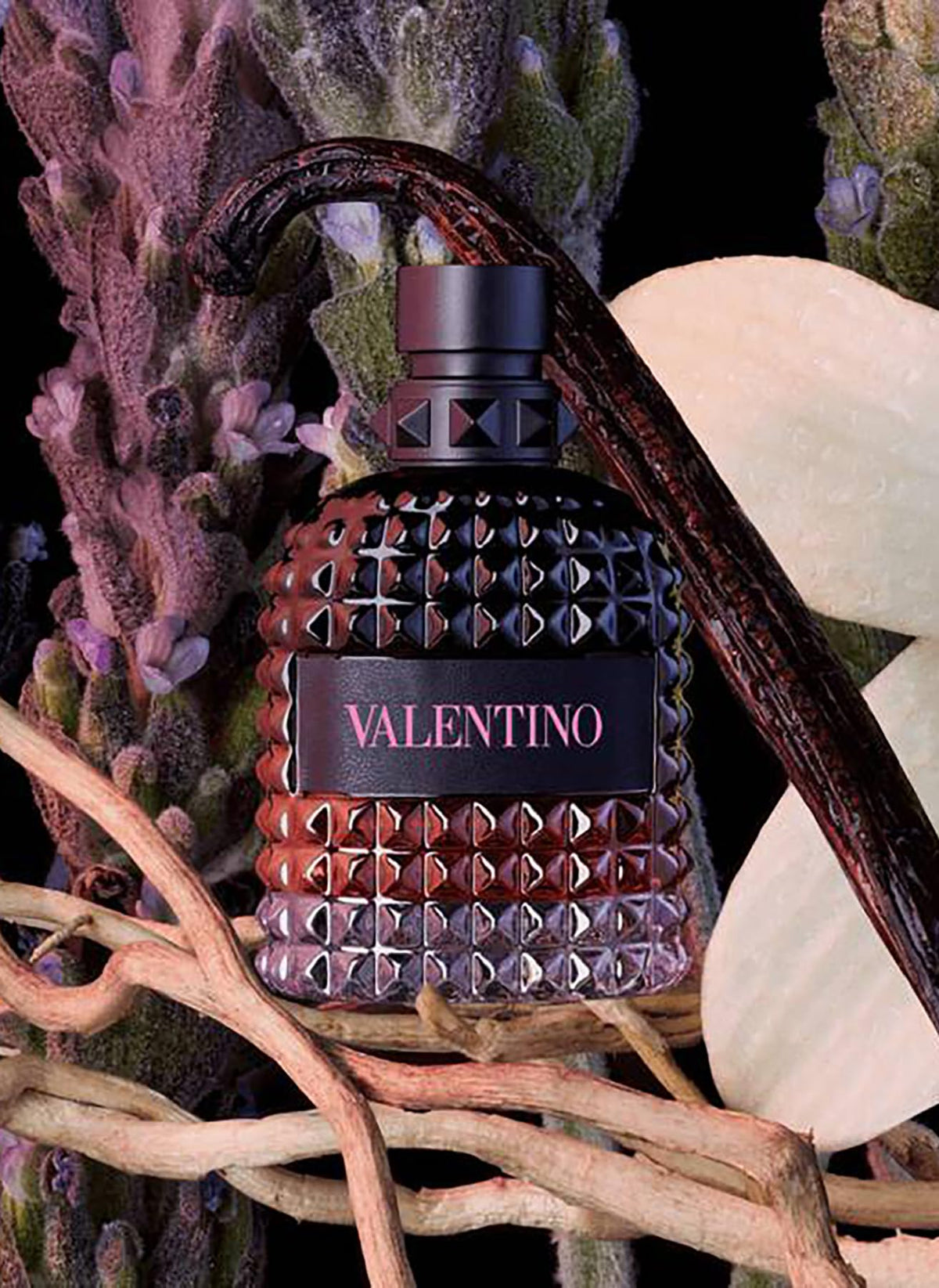 Valentino bottle being sprayed on wrist highlighting easy application benefit