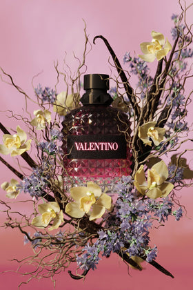 Close-up of vanilla and vetiver notes with Valentino branding for scent detail