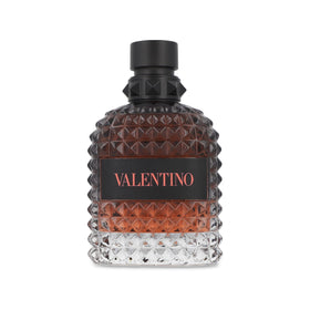 Valentino bottle close-up highlighting glass texture and spray nozzle for precise application
