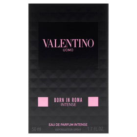 Valentino bottle in hand illustrating 1.7 oz scale and portable evening use